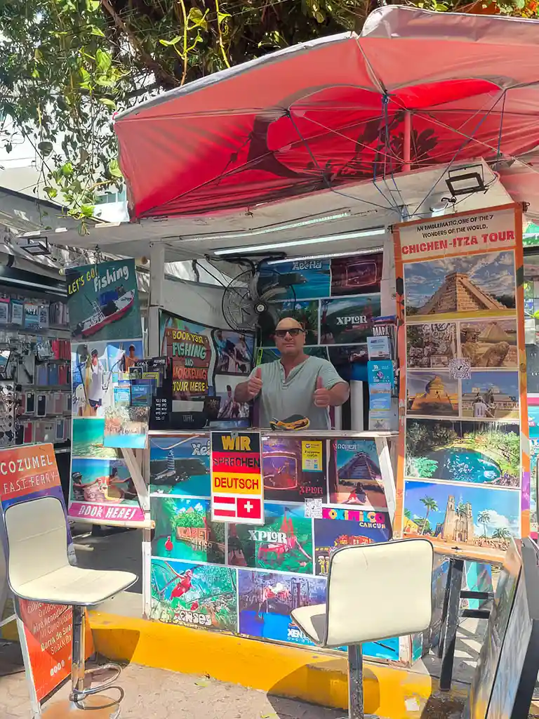 Mexitours24 tour stand on Quinta Avenida in Playa del Carmen offering personal advice on Riviera Maya tours